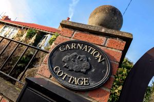 Nameplate- click for photo gallery